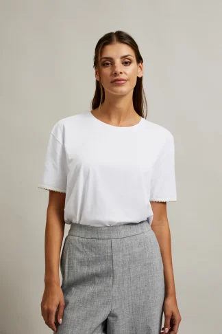 T-shirt damski i koralikami na rękawach rozmiar XL